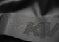 Kundenspezifisches eingebranntes Jacquardwebstuhl-Gummiband-Band des Logo-52mm mit doppeltem mit Seiten versehenem Material