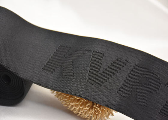 Kundenspezifisches eingebranntes Jacquardwebstuhl-Gummiband-Band des Logo-52mm mit doppeltem mit Seiten versehenem Material